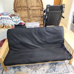 Futon bed with wooden frame