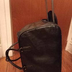 HandBag That Turns Into CarryOn With Wheels & Handle