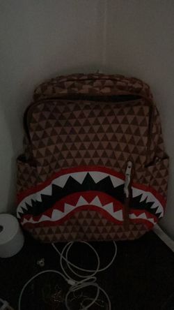 Spray ground backpack