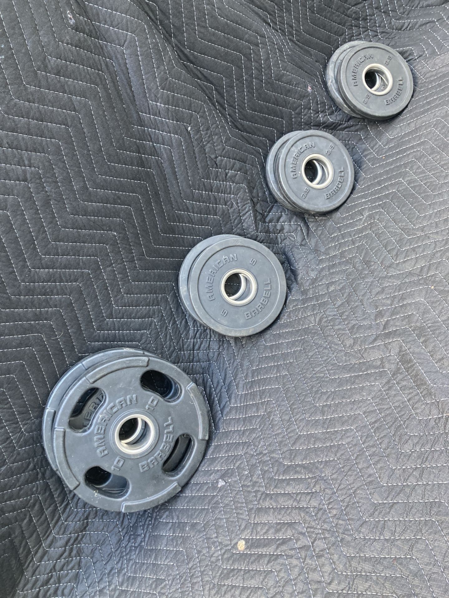 American Barbell Olympic Weight Plates For Your Home Gym