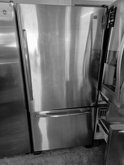 Bottom frezzer maytag Refrigerator Stainless Steel 33 inches wide 68 tall with ice maker reconditioned