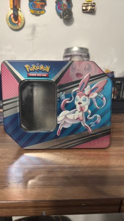 5 empty pokemon tins