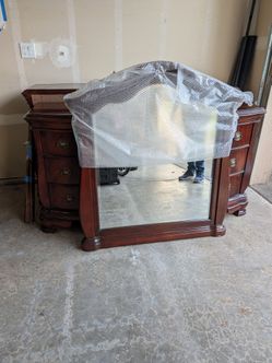 Dark wood dresser with mirror