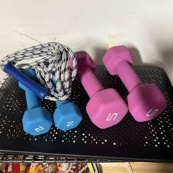 Unused Dumbbells And Skipping Rope