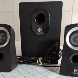 Logitech Speakers and one Bluetooth Speaker 