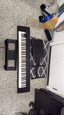 Yamaha keyboard with stool