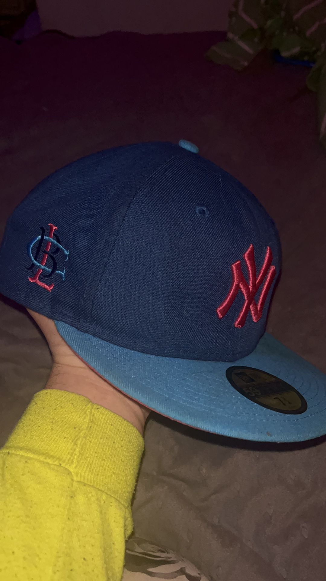 NY blue with pink hat