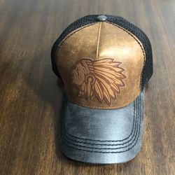 Hat India head leather patch tan leather ball cap adjustable back snap fitted.