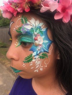 Face painting/ Pinta caritas.