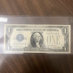 1928-A 1 Dollar Funny Back Silver 