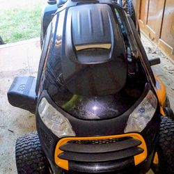Poulan Pro Riding lawn mower with wheelbarrow