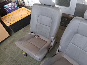Gray Leather Car Seats with Headrest and Seatbelt