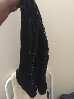 Pair black knee high lace up the back boot size 10