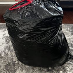 Three Bags Of Clothes And Shoes