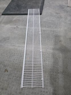 Wire hanging shelves.