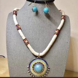 White and blue ethnic pendant necklace