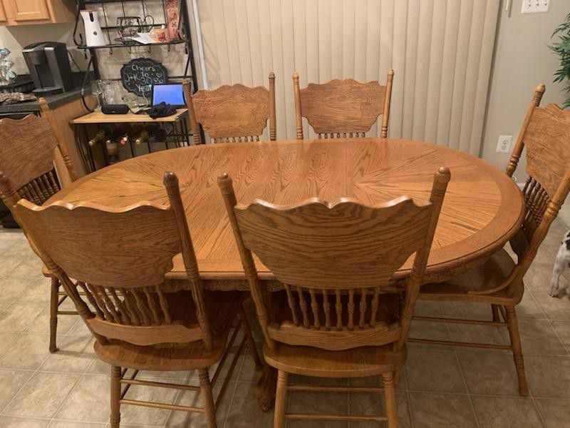 Kitchen Table w/ chairs & leaf. Couch w/ couch bed and Recliner