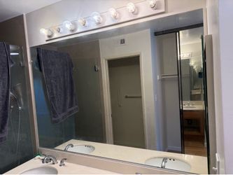 Two bathroom mirrors 5’7” x 3’10”