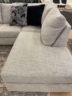 Ashley megginson storm sectional deals