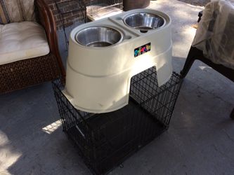 Food and water bowl and cage $40 for both