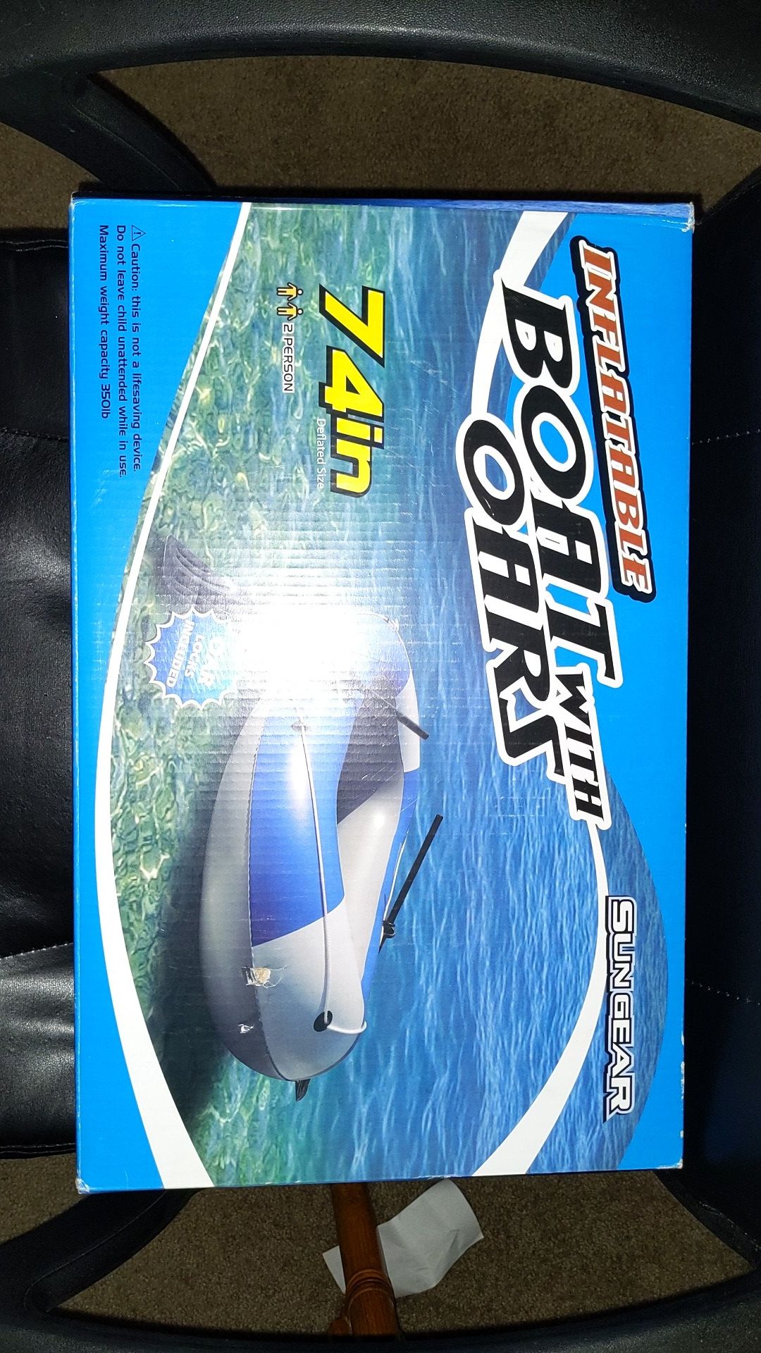 Singer inflatable boat with oars