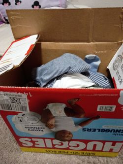 Box full of baby boy clothes