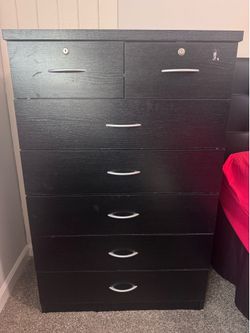 Black dresser with 7 drawers