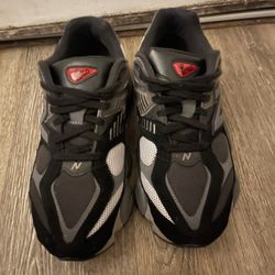 New Balance 878 trainers in black and grey $100