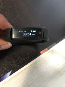 Fitness tracker with built in USB Charger