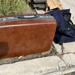 Free - LUGGAGE - & large duffle travel bag = used (at my curb - help yourself TODAY) And roofing shingles & square tiles.