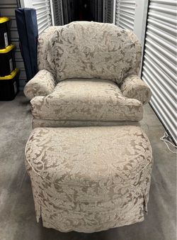 Upholstered Armchair and Ottoman Set