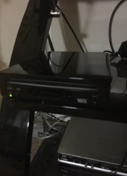 Wii with lots games and controllers