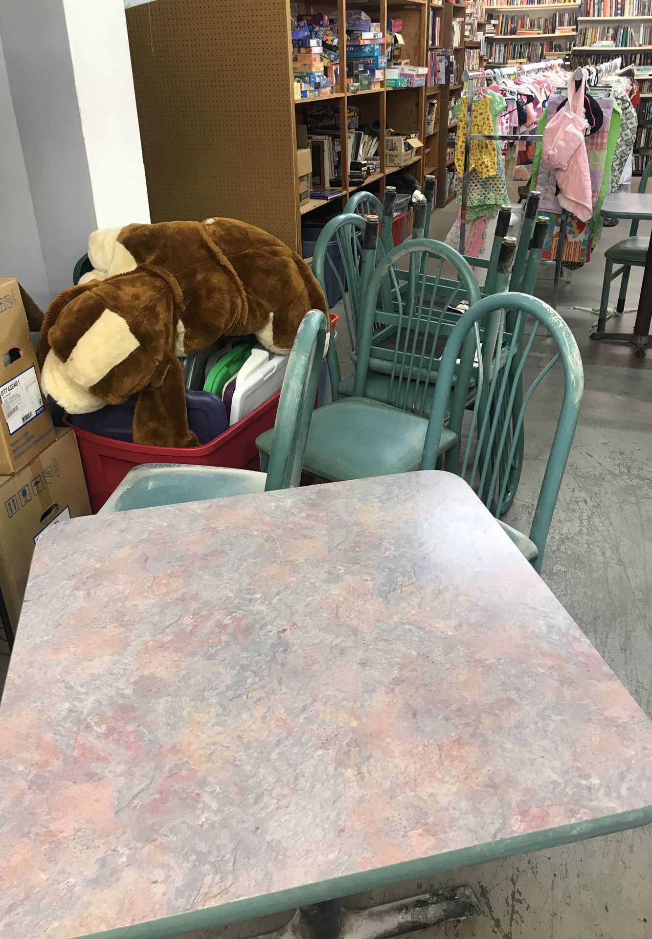 Small table and four restaurant chairs only $50