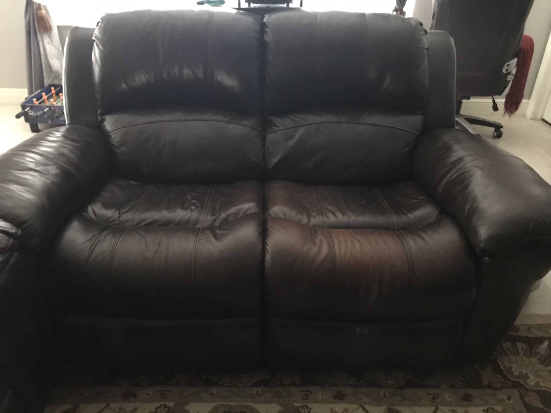 Leather rocking chairs , sofa chairs, couches and love seat ( all chairs recliner ) elephant coffee table good condition moving must sale OBO