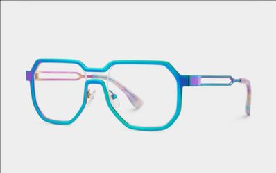 Vibrant iridescent geometric turquoise eyeglasses with a metal frame