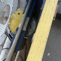 Yellow Grey And Blue Saw And Table