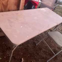 A Good Folding Table (48” Long X 20” Wide X 28” Tall) With A Folding Chair, Need Cleaning 