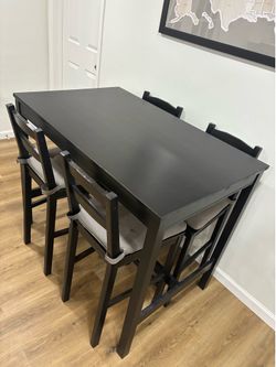 Dining room table with chairs