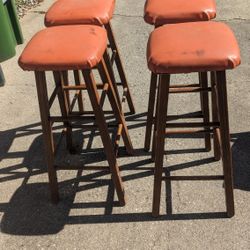 LOT OF 4 VINTAGE ORANGE BAR STOOLS MAKE OFFER