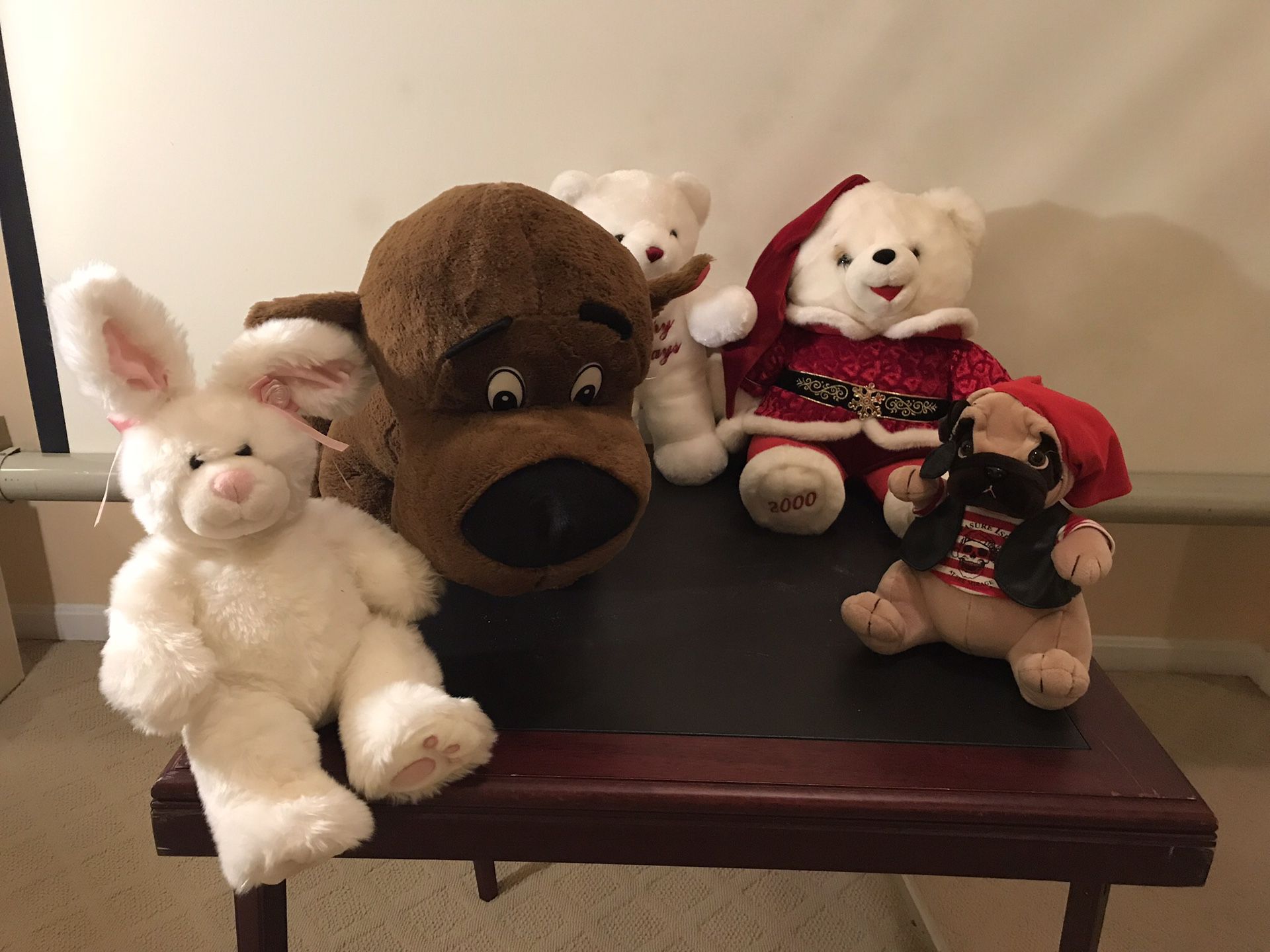 stuffed animals all for $15, one is a Christmas bear