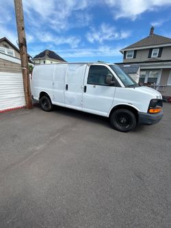 White Chevy Cargo van 2500