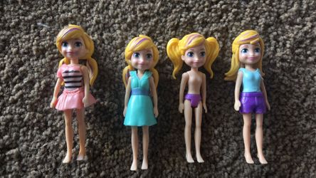 FOUR POLLY POCKET DOLLS 