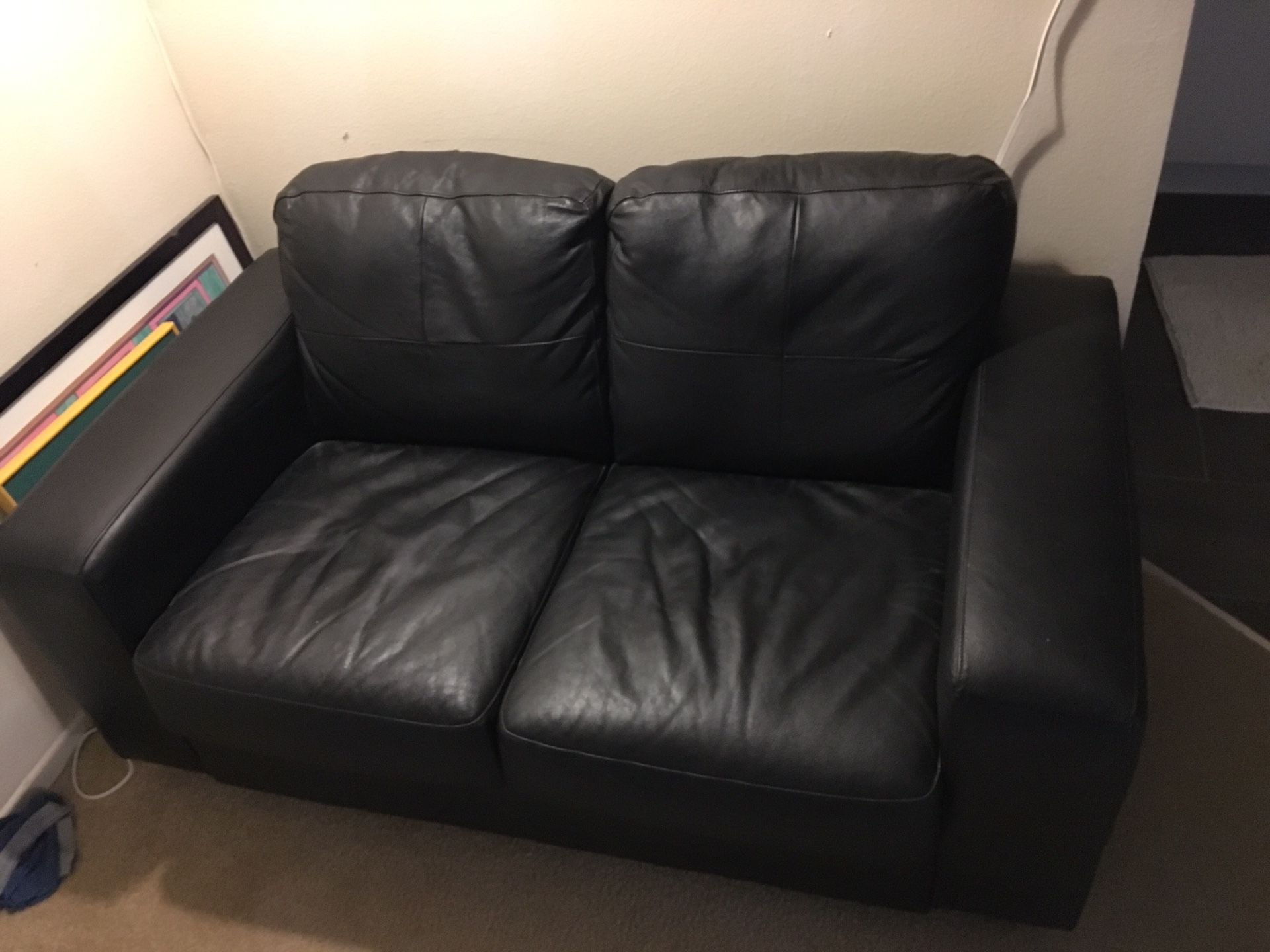 Black Leather sofa.