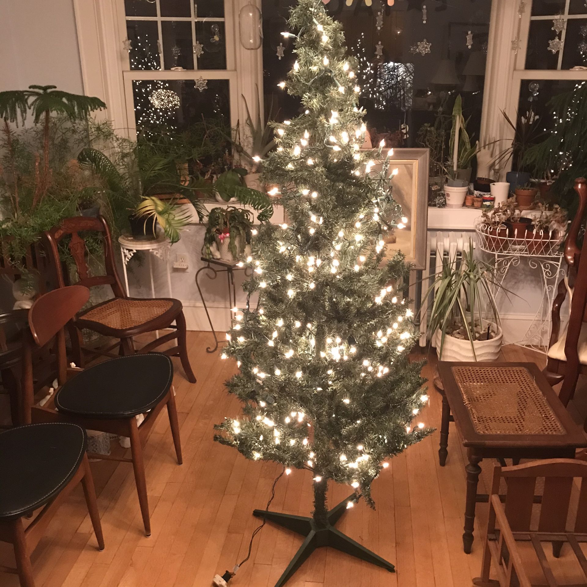 Artificial Christmas Tree Built On Stand Approx 5’5” Tall X 2’ Wide With String Lights