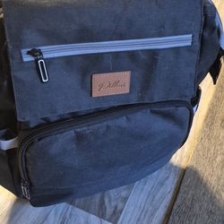 Diaper backpack with changing station 