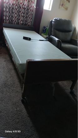 Twin size hospital bed, new mattress semi automatic
