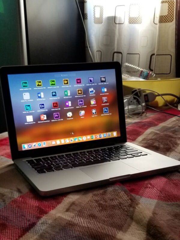 MacBook PRO 2012 model with charger silver