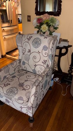 TWO decorative fabric recliner chairs