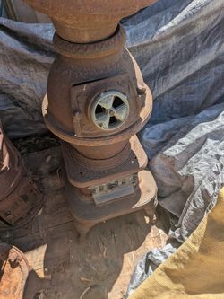 Vintage cast iron water heater  and wood burning stove