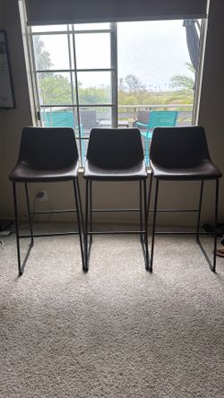 Brown faux leather stools